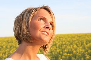 Making Good Decisions - Blonde-haired Woman in Thoughtful Pose"