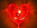glowing red heart candle