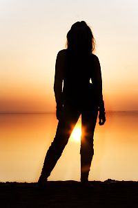 Trusting Yourself - Woman's Silhouette in Sunlight